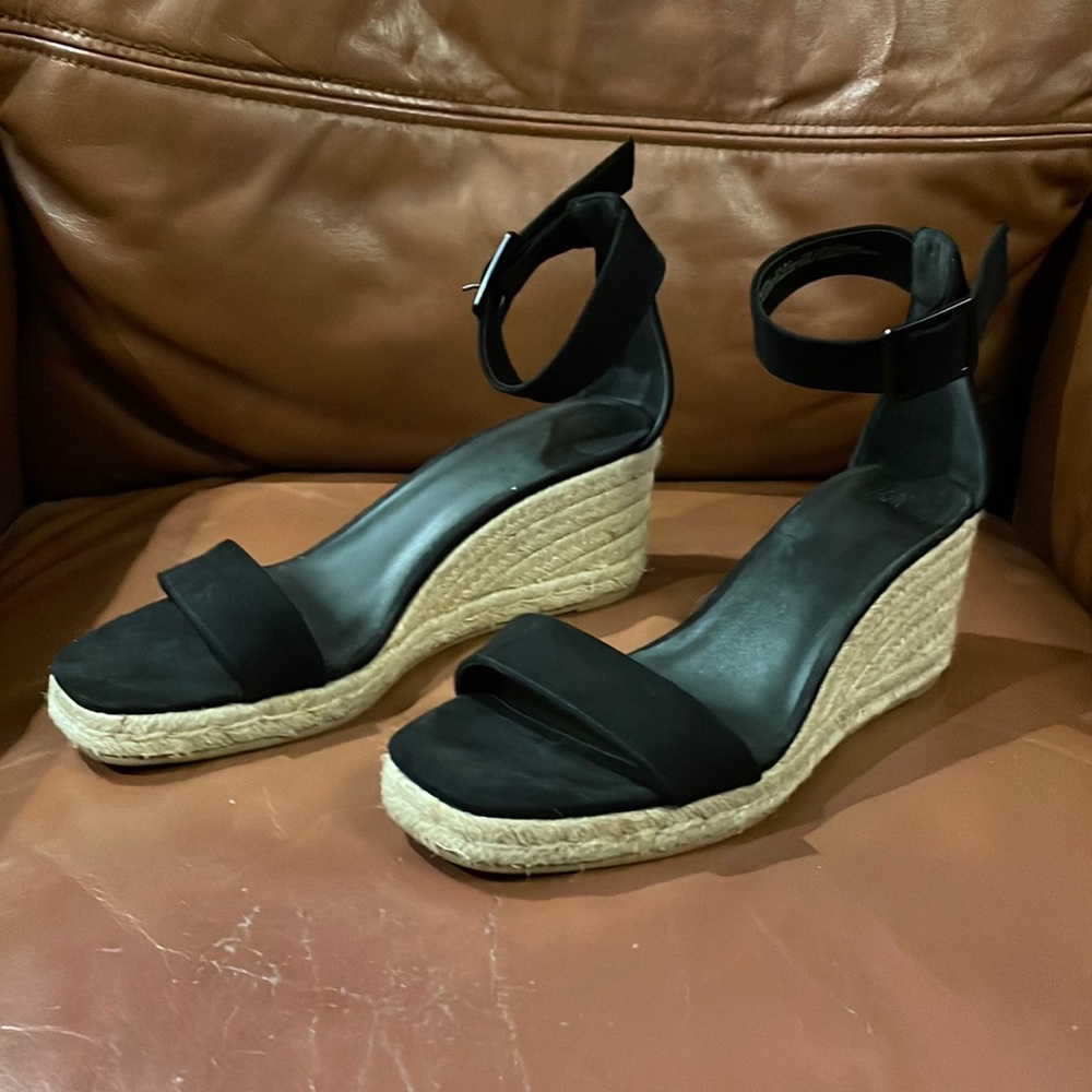 Black wedge sandals with ankle straps